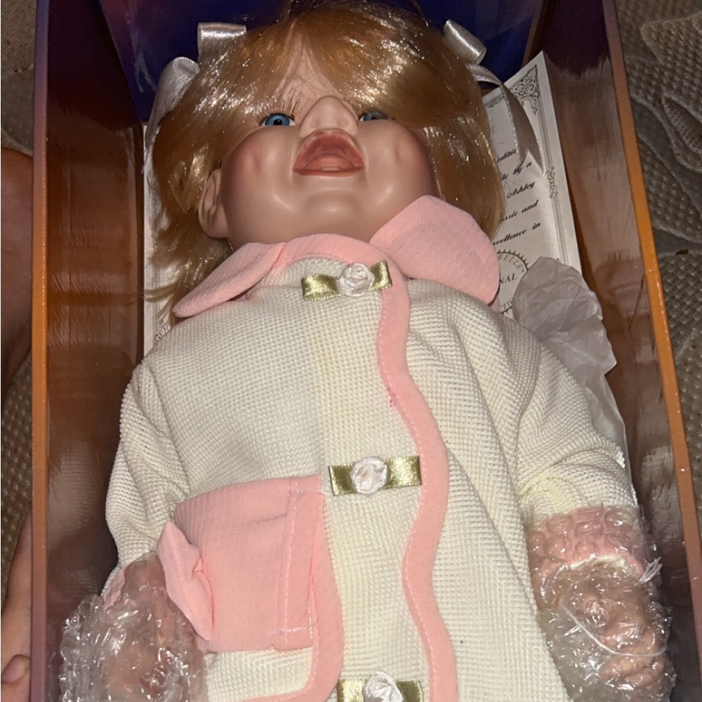 Adorable Pink and Cream Doll with Bow Accents